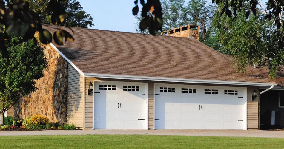 Stamped Carriage House Garage Doors by Matrix Exteriors